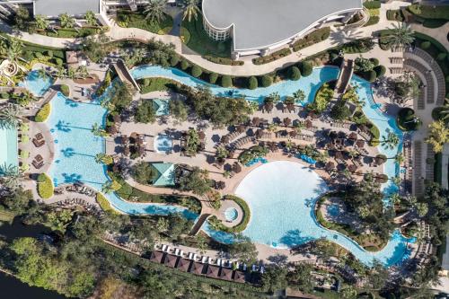 an aerial view of the pool at a resort at Signia by Hilton Orlando - An Official Walt Disney World Hotel in Orlando