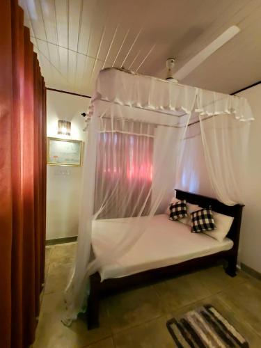 Llit o llits en una habitació de Jungle House
