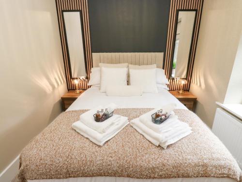 Ένα ή περισσότερα κρεβάτια σε δωμάτιο στο Loco Lodge