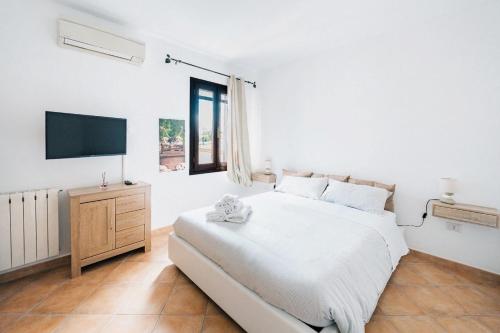 Ένα ή περισσότερα κρεβάτια σε δωμάτιο στο Niki's House Garden