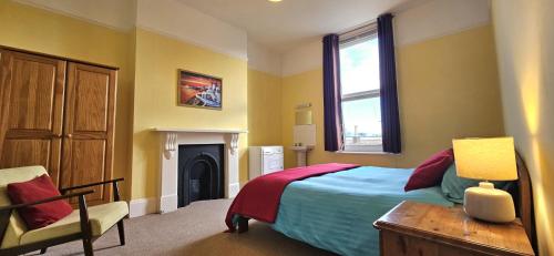 Postel nebo postele na pokoji v ubytování Lennox Lodge