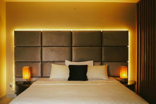 Ένα ή περισσότερα κρεβάτια σε δωμάτιο στο Serenity Residence Mirpur