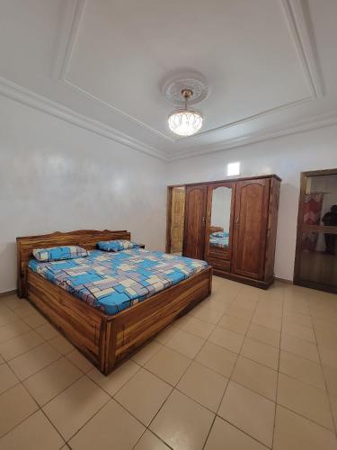 Ένα ή περισσότερα κρεβάτια σε δωμάτιο στο Appartement deux chambres-salon