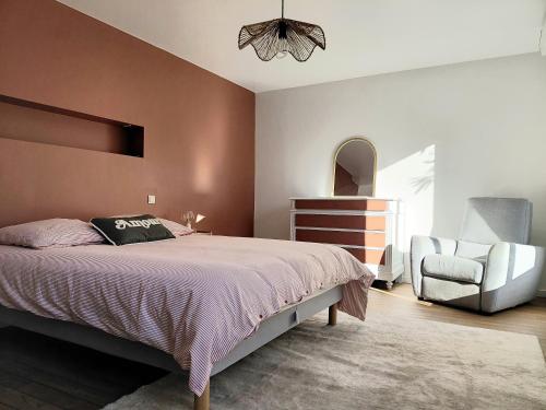 Postel nebo postele na pokoji v ubytování Maison et Bonheur