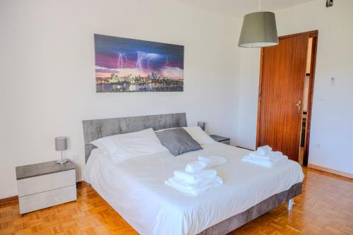 En eller flere senge i et værelse på Dimora del 700'