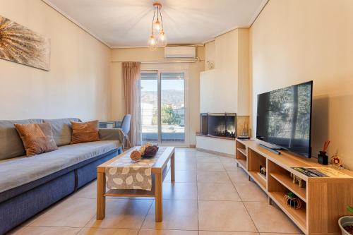 TV a/nebo společenská místnost v ubytování Thano's House 1