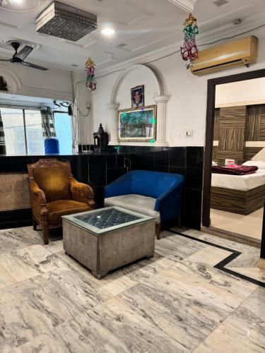 Χώρος καθιστικού στο Hotel Raj Deluxe