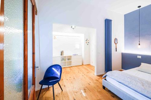 Ένα ή περισσότερα κρεβάτια σε δωμάτιο στο Ser Ridolfo 14 Loft