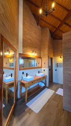 Postel nebo postele na pokoji v ubytování Chalés Kairós