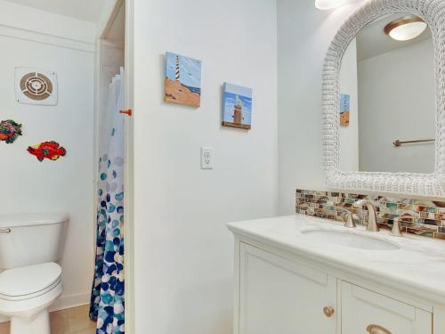 Un baño de Coast A While