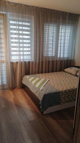 Postel nebo postele na pokoji v ubytování Апартамент войвода