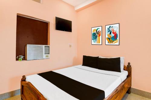 Una cama o camas en una habitación de HOTEL O SAI SOVA