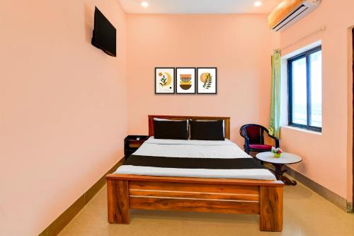 Una televisión o centro de entretenimiento en HOTEL O SAI SOVA