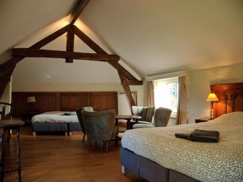 A bed or beds in a room at Havre de Paix - Séjour familial en pleine nature