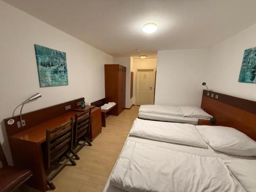 Kölner Hotel客房内的一张或多张床位