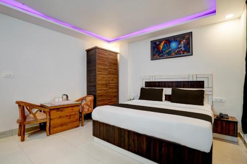 Voodi või voodid majutusasutuse Collection O Uttaranchal University Premnagar toas