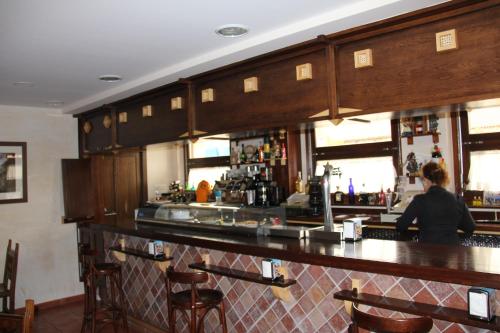 Lounge nebo bar v ubytování La Cantina del Tobero