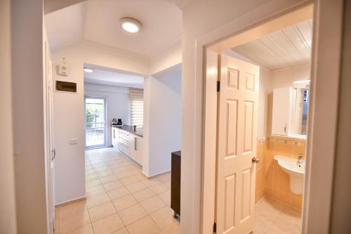 a bathroom with a sink and a toilet in a room at Villa Rosetta in Cedit