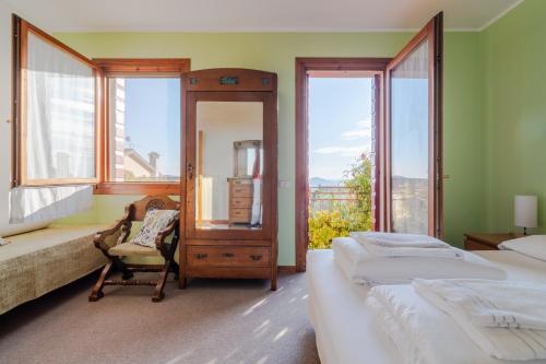 Ένα ή περισσότερα κρεβάτια σε δωμάτιο στο Casa Alba