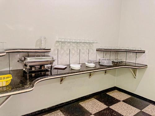 Η κουζίνα ή μικρή κουζίνα στο Hotel Coutinho PIO XII