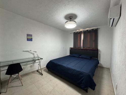 Giường trong phòng chung tại Marina Diamante con Rooftop y Jacuzzi