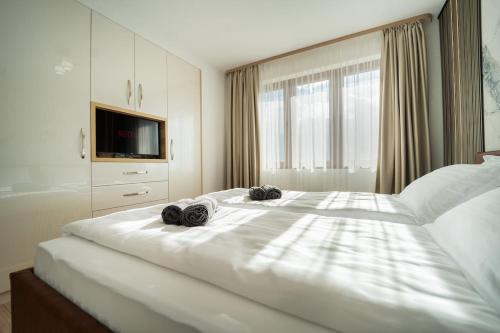 Ένα ή περισσότερα κρεβάτια σε δωμάτιο στο Best Central LUX Studio