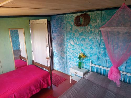 Una cama o camas en una habitación de Biodiversidad