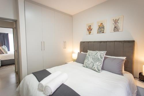 En eller flere senge i et værelse på Luxury York Retreat - Apartment 34