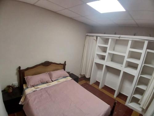 Giường trong phòng chung tại La Casona Hostel