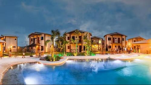 Swimmingpoolen hos eller tæt på Sunshine Chalet - Cozy Stay in Santo Amaro - Dunas Village Residence