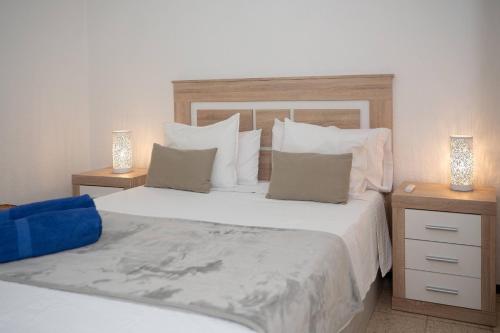 Ένα ή περισσότερα κρεβάτια σε δωμάτιο στο James Sun