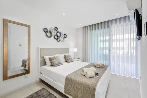 En eller flere senge i et værelse på Sea & The City Luxury Apartment - Lagos