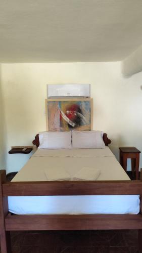 Postel nebo postele na pokoji v ubytování Espaço Akronos Residence