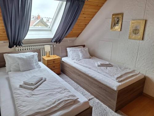 Ένα ή περισσότερα κρεβάτια σε δωμάτιο στο Vila Gabriel