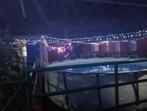 La alberca dentro o cerca de CASA GRANDE FINCA EL CALABRES