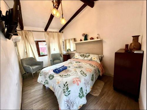 En eller flere senge i et værelse på Casa Posada Doña Miriam Caraz Perú