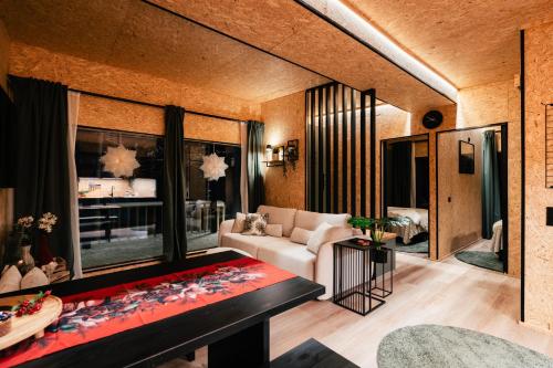 Ένα ή περισσότερα κρεβάτια σε δωμάτιο στο Ternu Forestvilla