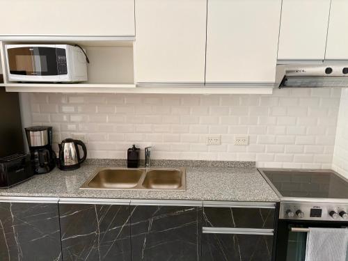 Køkken eller tekøkken på Gente del Sur - Avenida