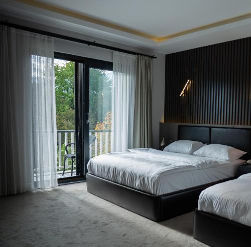 En eller flere senge i et værelse på Didi Hotel Sapanca