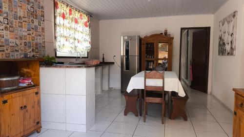 Kuchyň nebo kuchyňský kout v ubytování Casa Itapoá!