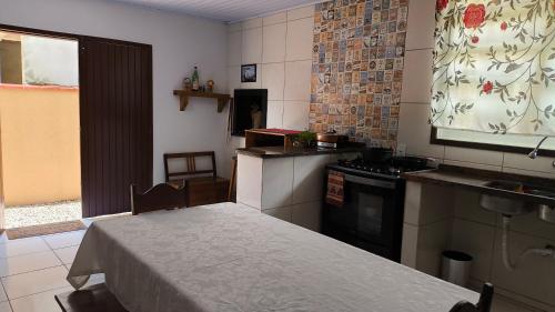 Kuchyň nebo kuchyňský kout v ubytování Casa Itapoá!