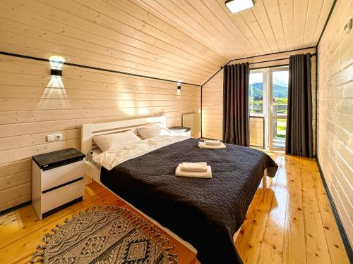 En eller flere senge i et værelse på gray house kryvorivnya