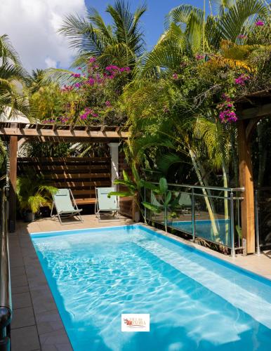 Swimmingpoolen hos eller tæt på Villas Ixora