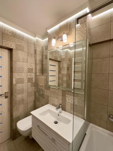 Ένα μπάνιο στο Christmas Market View Apartment