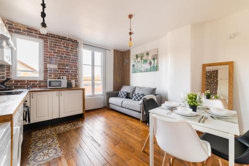 Kuchyň nebo kuchyňský kout v ubytování Le Zénith - Porte de Paris - Stade de France