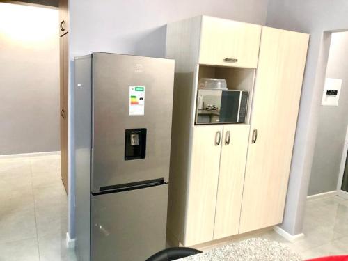 Η κουζίνα ή μικρή κουζίνα στο Serenity at Urban Space