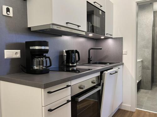 Kuchyň nebo kuchyňský kout v ubytování select2stay - Business Apartments