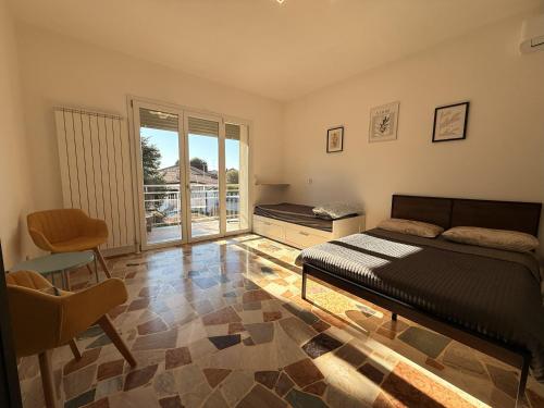 Ένα ή περισσότερα κρεβάτια σε δωμάτιο στο Casa Buda Maggiore