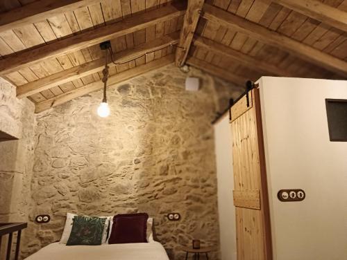 Postel nebo postele na pokoji v ubytování CasaManuela