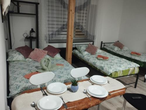 Ένα ή περισσότερα κρεβάτια σε δωμάτιο στο U Kasi